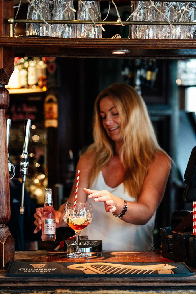 A drink being prepared at the bar
